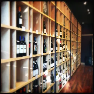 a wall of wine bottles