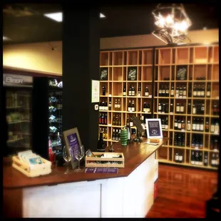shelves of wine in a wine shop