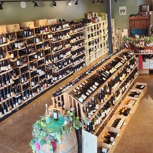 rows of bottles of wine on shelves