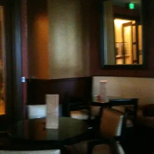 a table and chairs in a restaurant