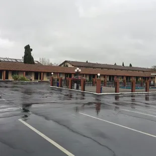 To the pool, through an open parking lot