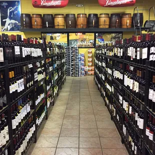 rows of wine bottles in a store