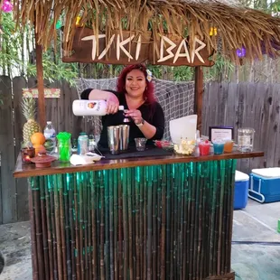 Karen our Winenot bartender making some delicious tiki drinks.