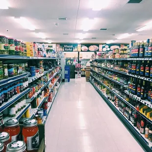 a wide aisle in a grocery store