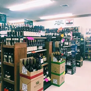rows of bottles of wine on shelves