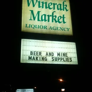 a lighted sign for a liquor agency