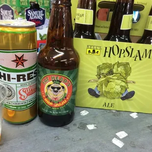 bottles of beer and a glass of beer