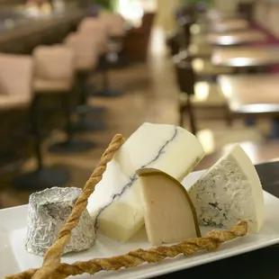 a plate of cheese and crackers