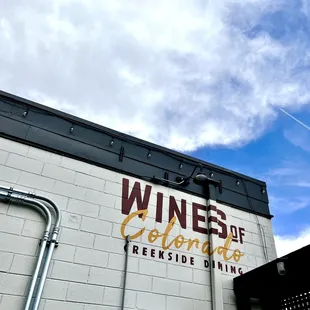 a sign on the side of a building