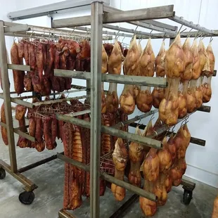 a rack of meat hanging from the ceiling