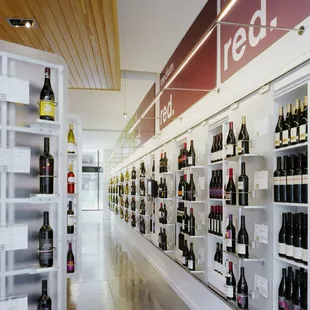 shelves of wine in a store