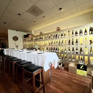 Communal seating and the wine wall.