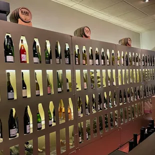 a wall of wine bottles