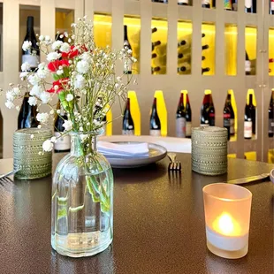 Cute flower arrangements on the table.