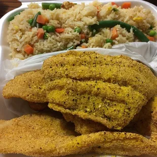 Fried catfish with lemon pepper seasoning and fried rice