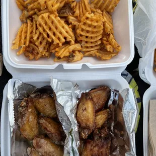 Garlic Parm and Maple Bacon flavored wings along with waffle fries! Wait time was approximately 12 mins