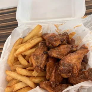 Buffalo ranch garlic wings and seasoned fries.