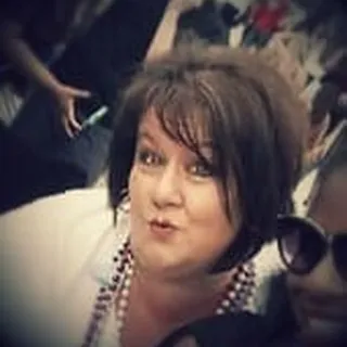 Gina J.