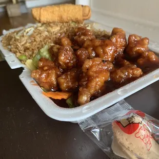 a plate of chicken and rice