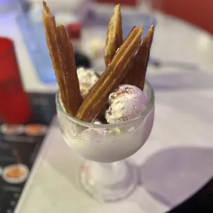 Strawberry cheesecake ice cream and Bavarian cream stuffed churros