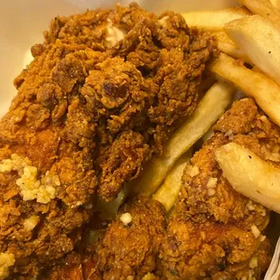 Extra dry Garlic  Parmesan chicken strips with very little sauce on them and soggy unseasoned fries