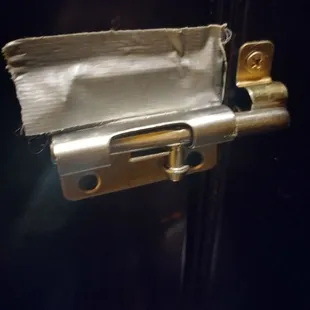 Yeah, that's Duct tape.... That's the managers fix in the woman's bathroom.  OVER A YEAR!   SERIOUSLY!