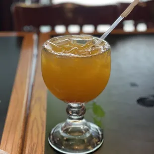 Peach margarita on the rocks