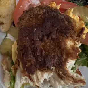 Buffalo chicken sandwich. Poorly made. Dry burnt and small.  Does not match the picture as they advertise