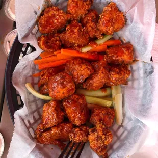 18 boneless wings: hot garlic, hot lemon pepper, hot teriyaki