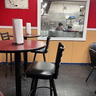 a view of the kitchen through the window
