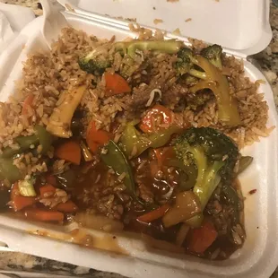 HUGE lunch portion of  szechuan beef   Already ate the huge egg roll. And a few bites may be missing hehe