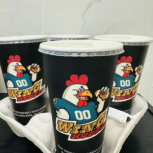 three cups of ice cream on a tray