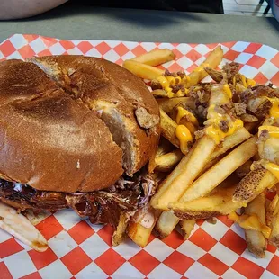 Pulled pork sandwich with bacon cheese fries.