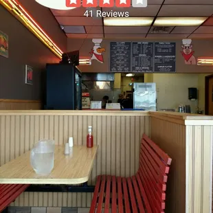a table and benches in a restaurant