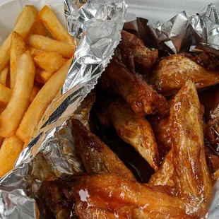 Spicy honey BBQ wings. Fresh, crisp and nice seasoned fries.
