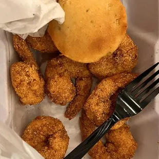 a fork and some fried food