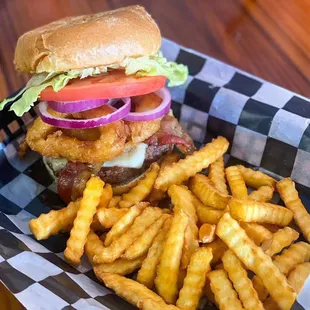 a burger and fries in a basket