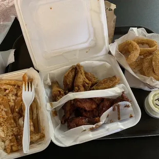 Cajun Fries, Onion Rings, and Roasted Garlic/Sweet Heat chicken with Ghetto Punch.