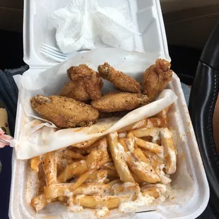 6 piece rogo (rosemary and garlic) wings, Cajun ranch fries, and a ghetto punch (not pictured)