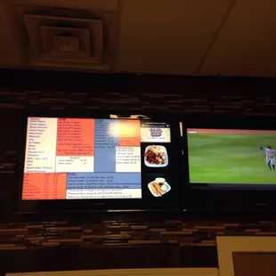 two televisions on the wall