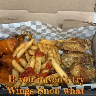 Buffalo and lemon pepper wings with fries