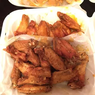 two trays of chicken wings