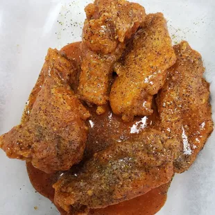 Lemon pepper dry rub tossed in Buffalo sauce!