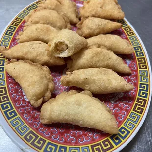 Chinese fried sweet dumpling, inside is peanut, coconut,and sesame.