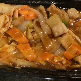 The "Hawaii Three Delight", chicken, shrimp, and scallops with fresh pineapple and veggies in a sweet and sour sauce!