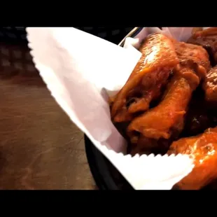 a basket of chicken wings
