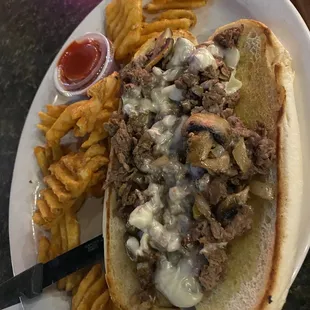 My friend had the cheesesteak sandwich and waffle fries