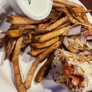 Buffalo chicken wrap and Fries