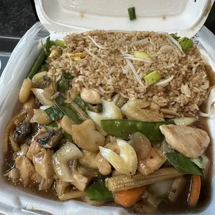 Gai Kow dinner combo, egg roll included. Huge portion! The fried rice is the BEST I&apos;ve ever had! So damn good! Tons of FRESH veggies!