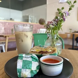 Cheesy Everything-JTM Spice Blend Breakfast Sandwich (Bacon, Egg, Cheese, Mayo), Range Life Hot Sauce & Ice Honey Latte!